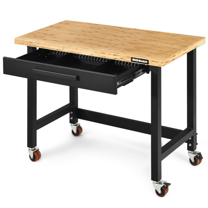 48 Inch Moveable Workbench 500 lbs Bamboo Tabletop Worktable with 360 Rotating Casters and Sliding Organizer Drawer